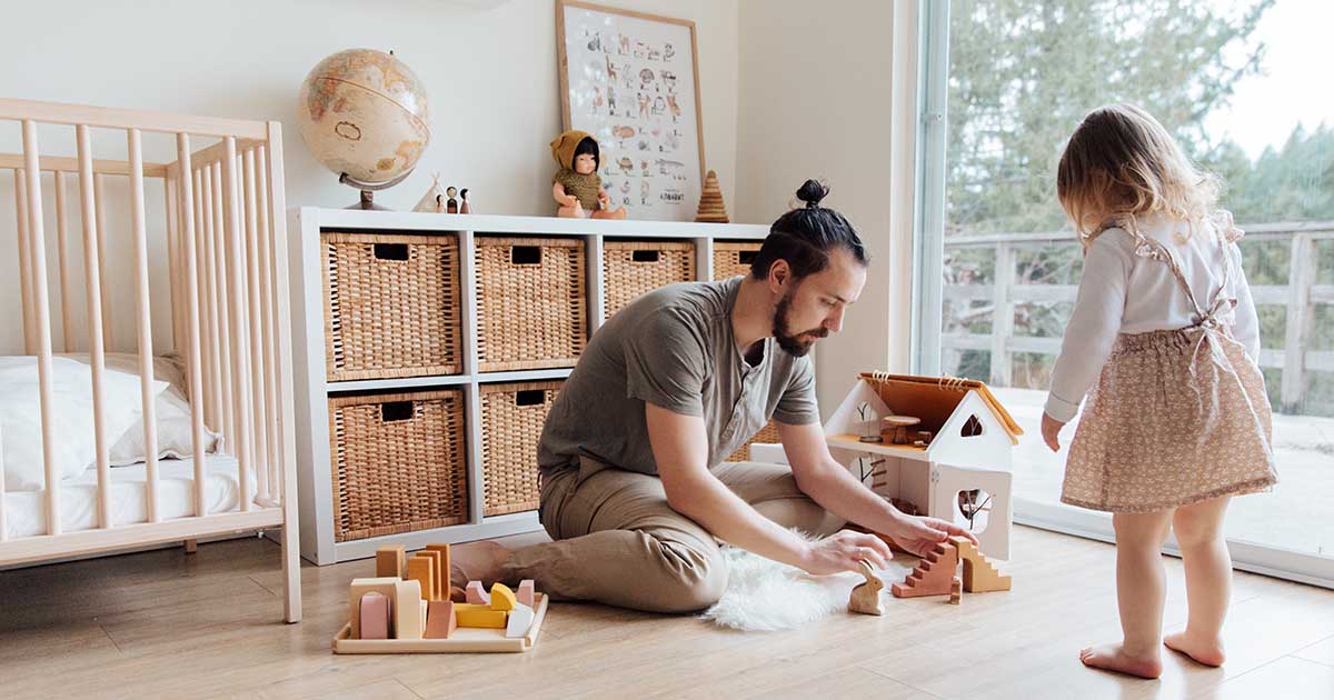 father playing with his daughter