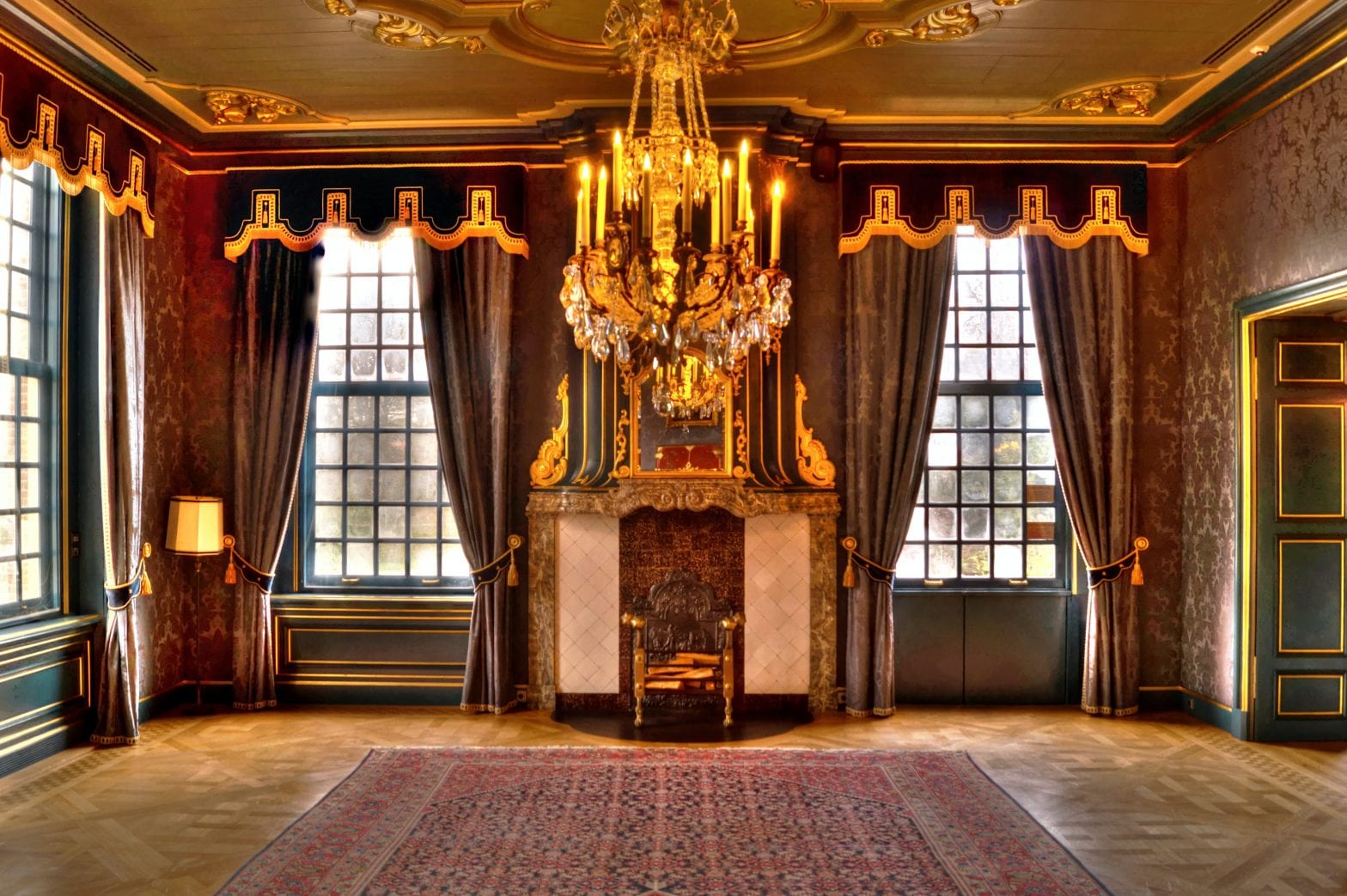Gold and White Chandelier Near Gray Curtains