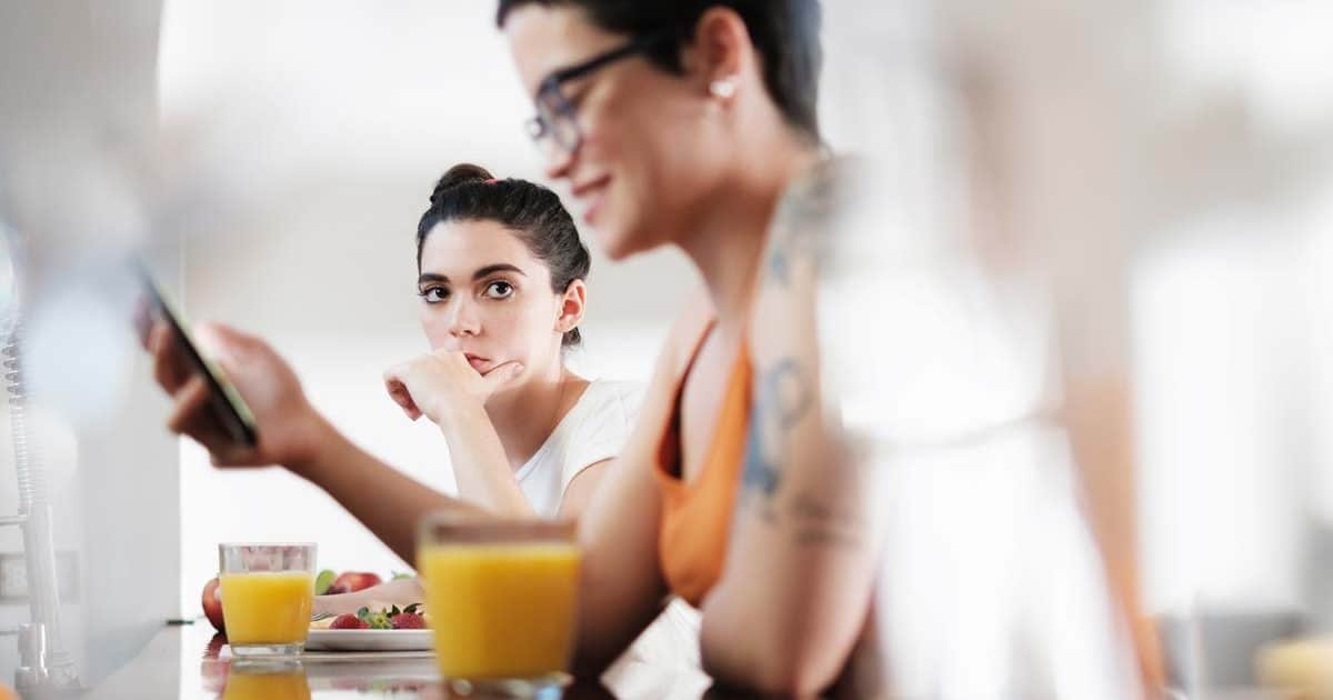 Woman is Jealous of Gay Partner Using Smartphone