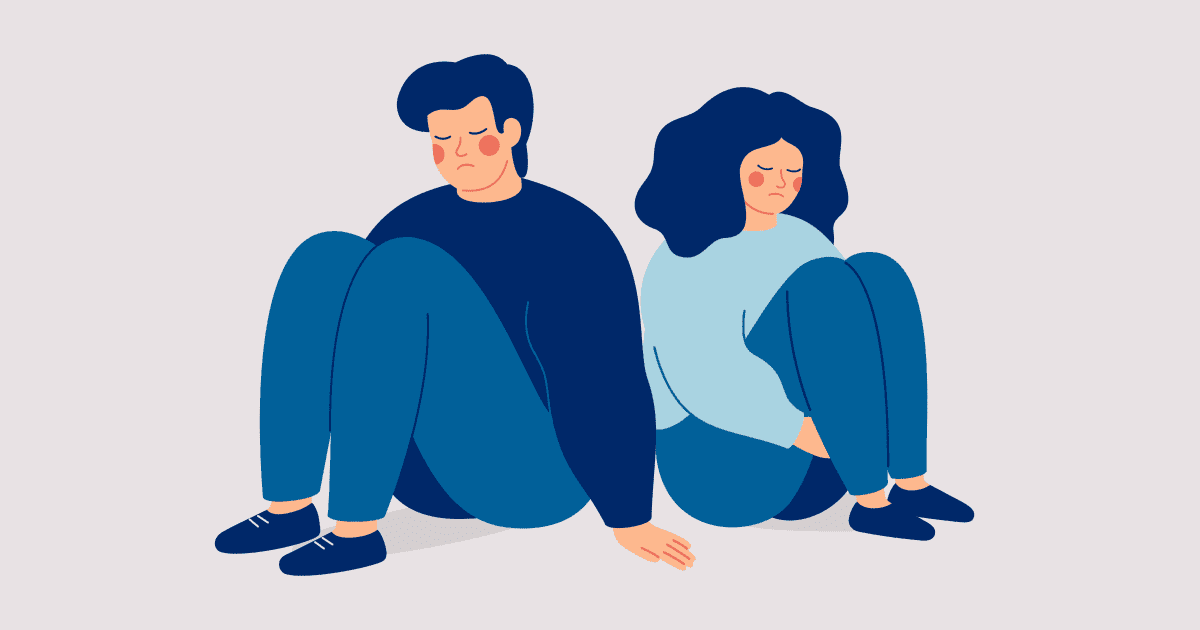 Sad man and woman sit back to back