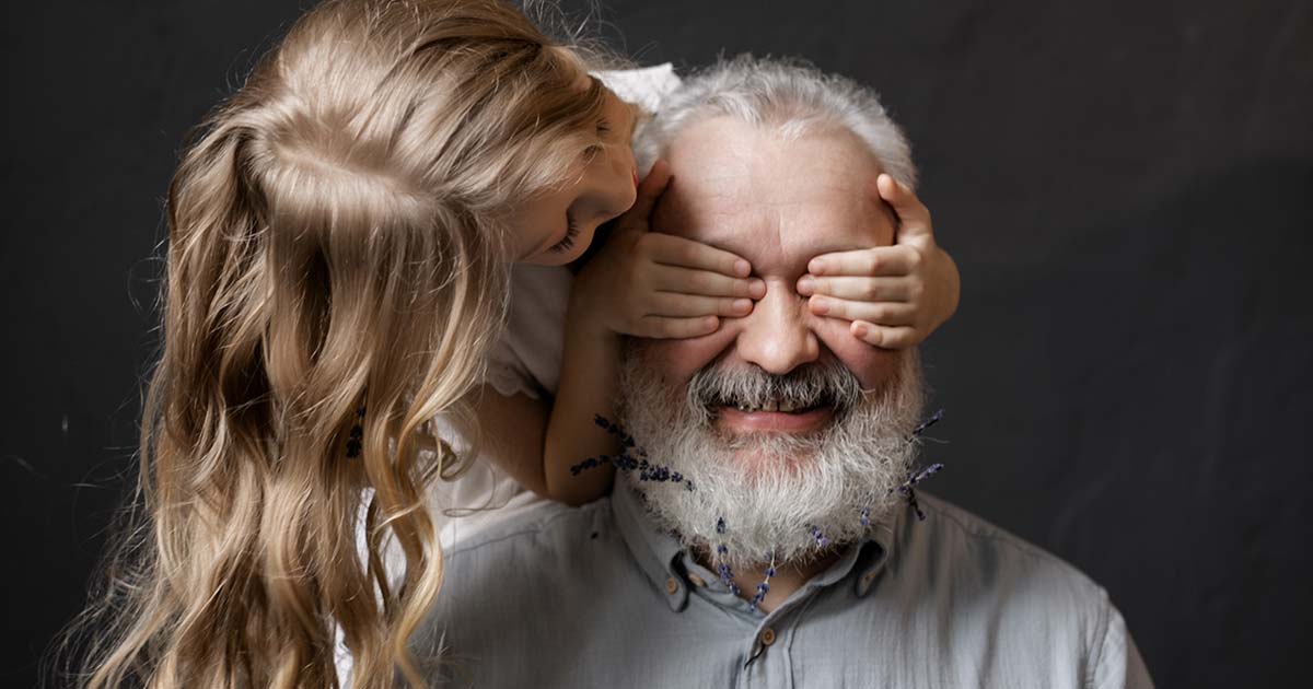 Granddaughter Playing with Her Grandfather