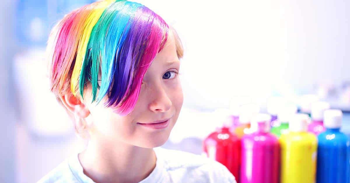 LGBTQ+ youth with rainbow colored hair