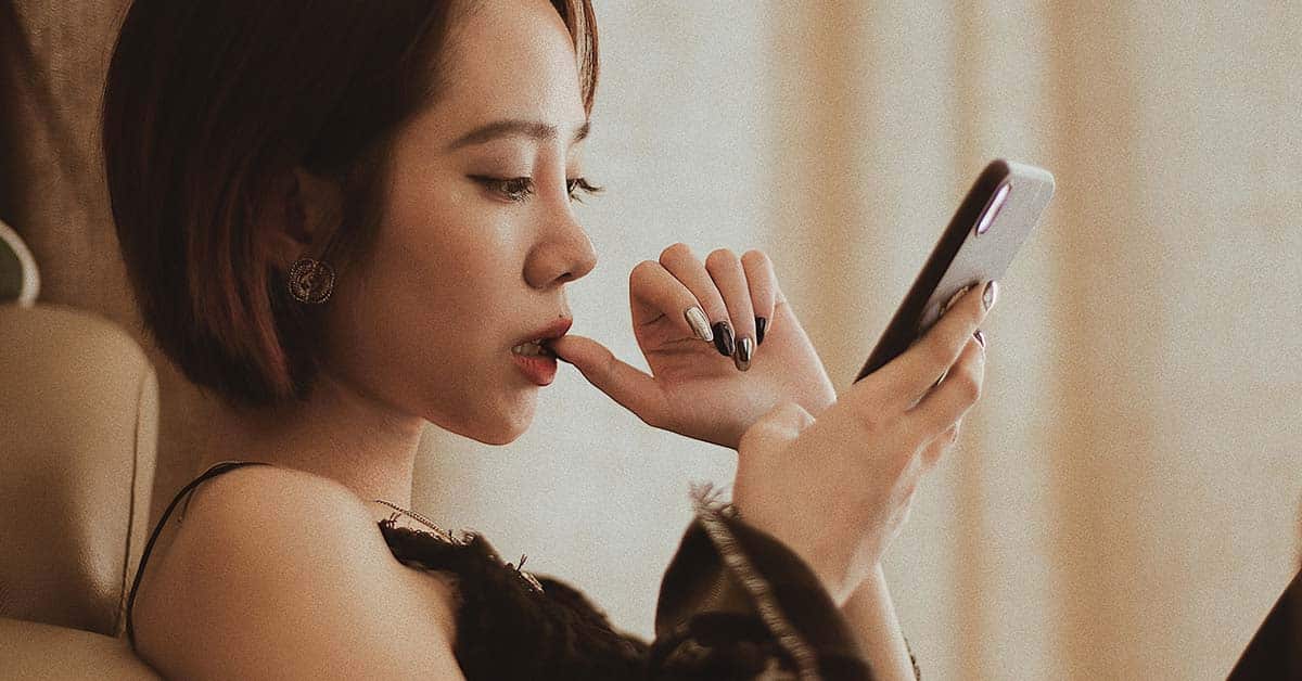 Photo of Woman Using Smartphone