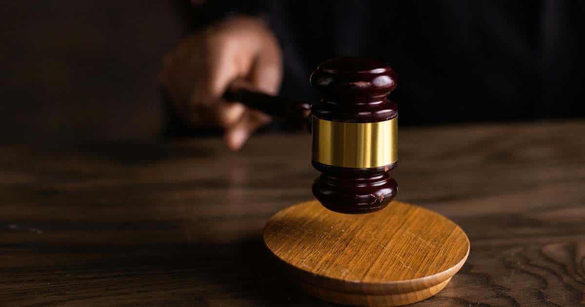 Brown Wooden Gavel on Brown Wooden Table